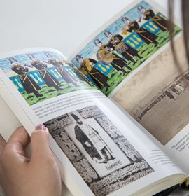 A girl reading a book (two sides of the pages with two graphics on each)